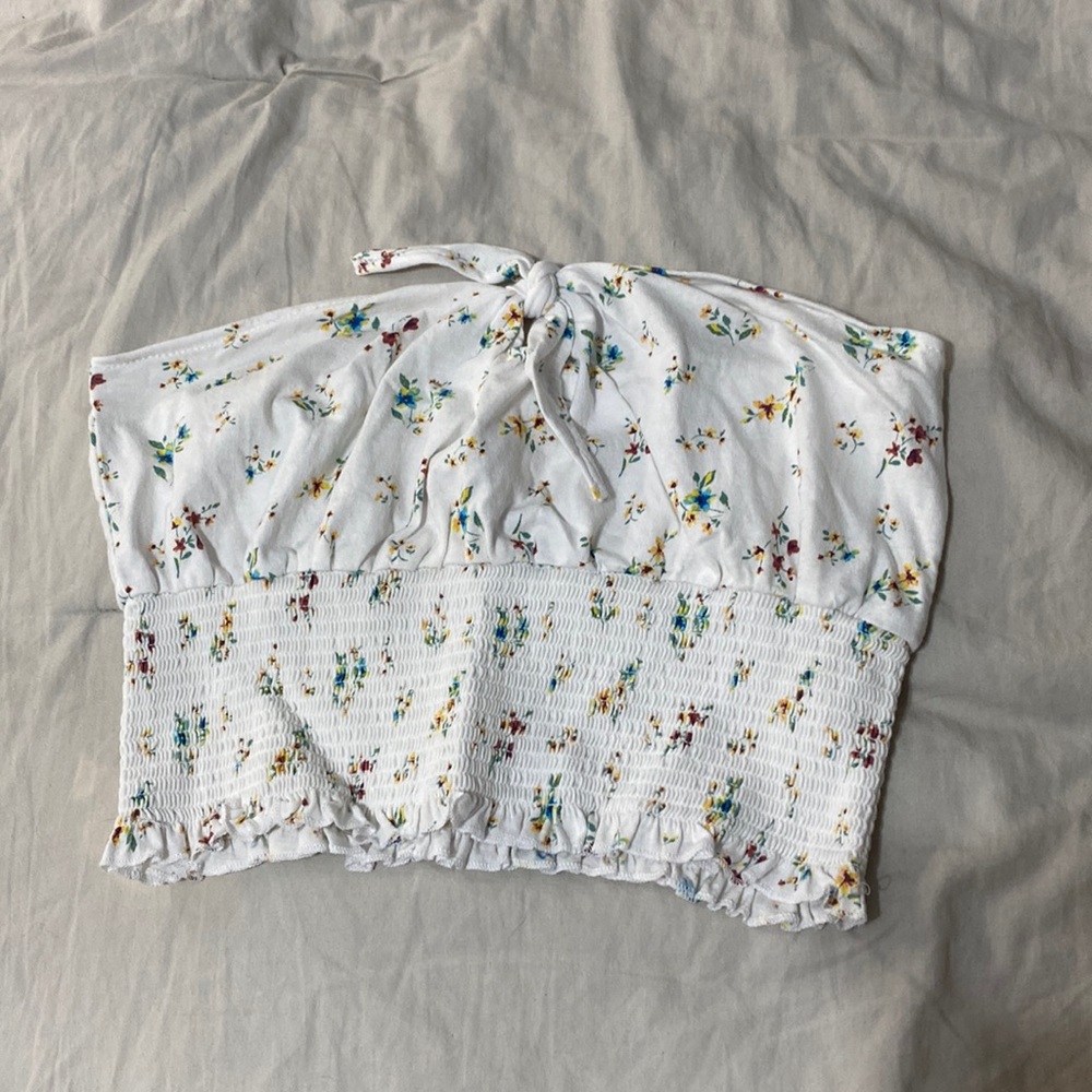 Strapless top with flowers. Size medium. Brand new